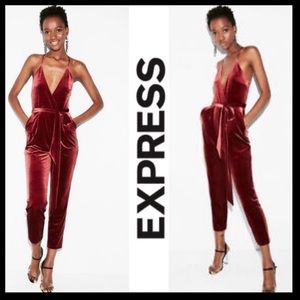 Express Burgundy velvet jumpsuit in a size 0.